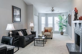 Large Windows in Carpeted Living Room